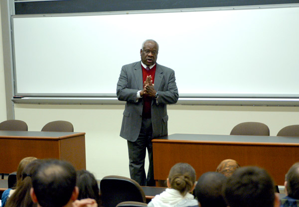 Supreme Court Associate Justice Clarence Thomas lectures to a group of GW Law students in professor Gregory Maggs contract class in 2011. 