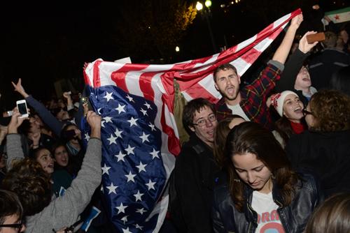 Some students carried American flags to the White House at about midnight. Becky Crowder | Senior Staff Photographer