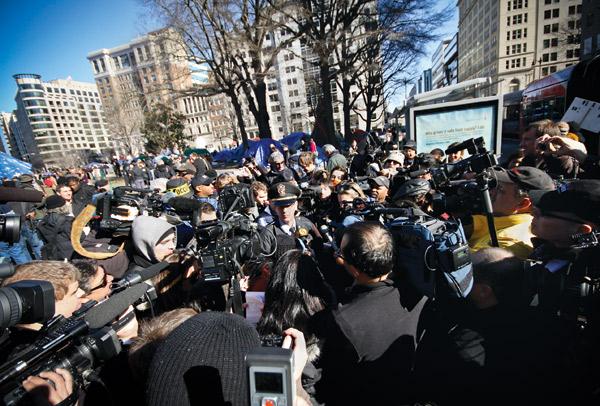This photo of the media asking Sgt. David Schlosser when the U.S. Park Police would evict the Occupy D.C. encampment in McPherson Square, by Hatchet staff photographer Freddo Lin, is a finalist for a regional Mark of Excellence Award from the Society of Professional Journalists.
