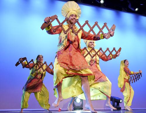 Students from eight university Bhangra teams competed at Warner Theatre Saturday night in Bhangra Blowout XXI. University of Virginias bhangra team swept first place. Benjamin Lim | Hatchet Photographer