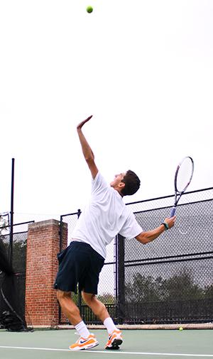 Then-freshman Danil Zelenkov hits a serve during practice last saeson. | Hatchet File Photo