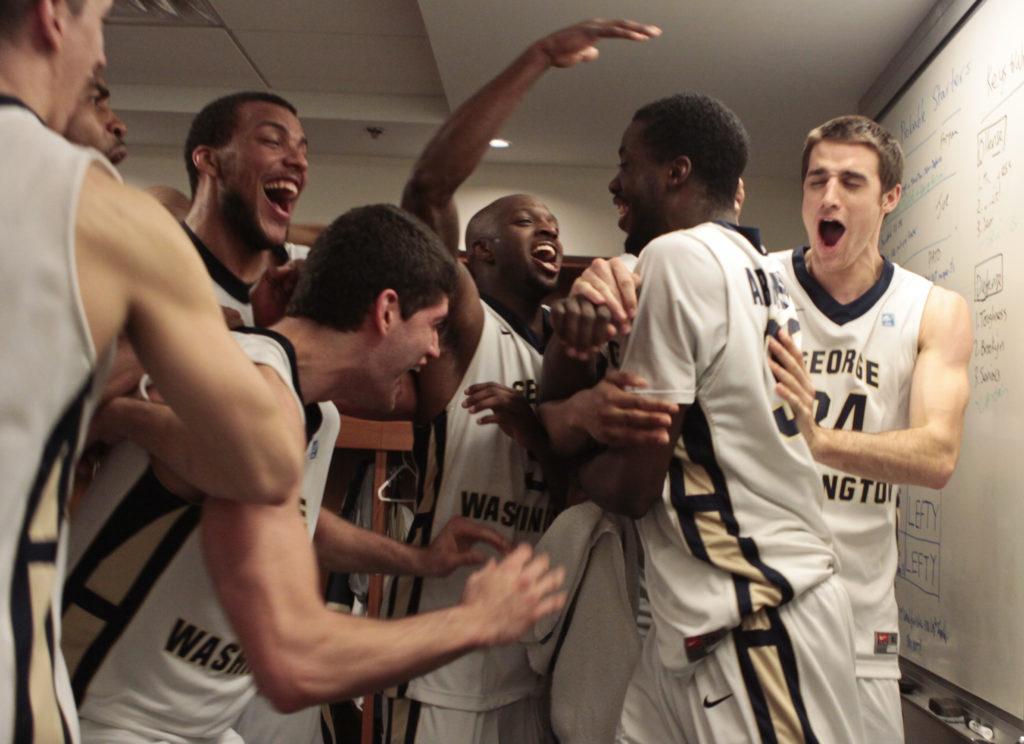 The+GW+players+celebrated+after+a+one-point+victory+against+Dayton+in+March.++Hatchet+File+photo%0A