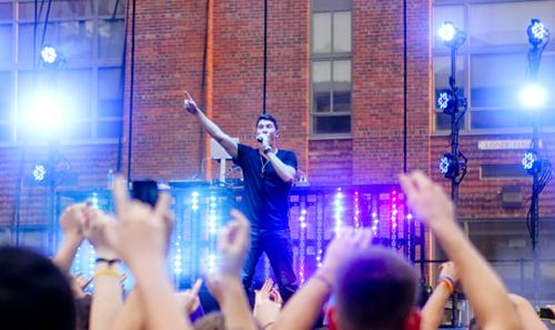 Timeflies vocalist Cal Shapiro hit the stage for Fall Fest on Saturday evening, showcasing covers, the groups hits and a freestyle rap about GW. Cameron Lancaster | Contributing Photo Editor