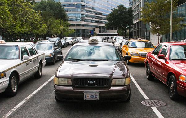 Taxi drivers are suing D.C. over legislation that they claim gives rideshare programs like Uber an unfair advantage. Hatchet File Photo.