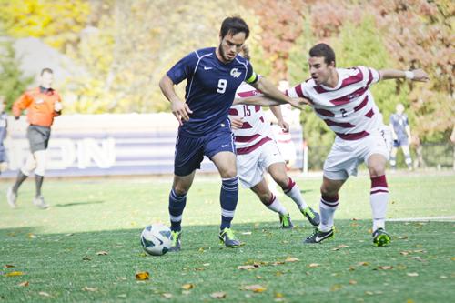 Forward Tyler Ranalli maneuvers past a Saint Josephs player in GWs disappointing 3-1 loss Friday. Cameron Lancaster | Contributing Photo Editor