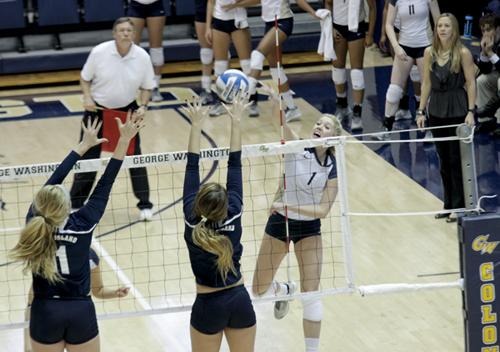 Senior outside hitter Rachael Goss, who tallied 10 kills for GW, spikes the ball during a match earlier this season.
Cameron Lancaster | Contributing Photo Editor 