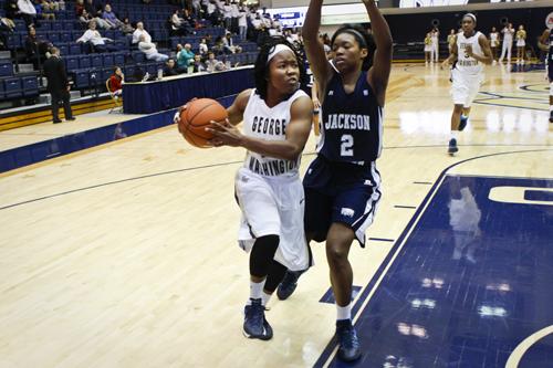 Guard Danni Jackson looks to maneuver a pass past Jackson State earlier in the season. Hatchet File Photo