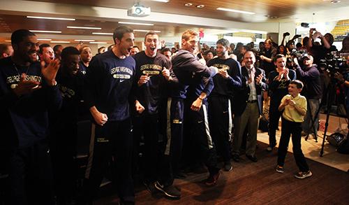 GW players and fans celebrate as GW is given a No. 9 seed in the NCAA Tournaments East region. Cameron Lancaster | Assistant Photo Editor
