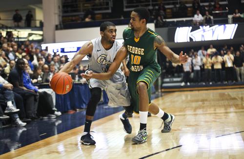 Graduate guard Maurice Creek looks for a pass during a game against George Mason last week. Hatchet File Photo
