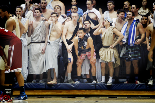 Members of the mens water polo team dressed in togas and cheered raucously earlier this year at the Smith Center. Hatchet File Photo by Cameron Lancaster