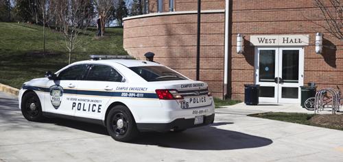 A GW police car was parked outside West Hall on Tuesday afternoon. Cameron Lancaster | Assistant Photo Editor