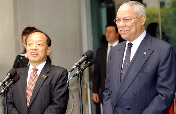 Secretary of State Colin Powell, right, with Chinese foreign minister Li Zhaoxing in 2004. Photo courtesy Wikimedia under the Creative Commons license.