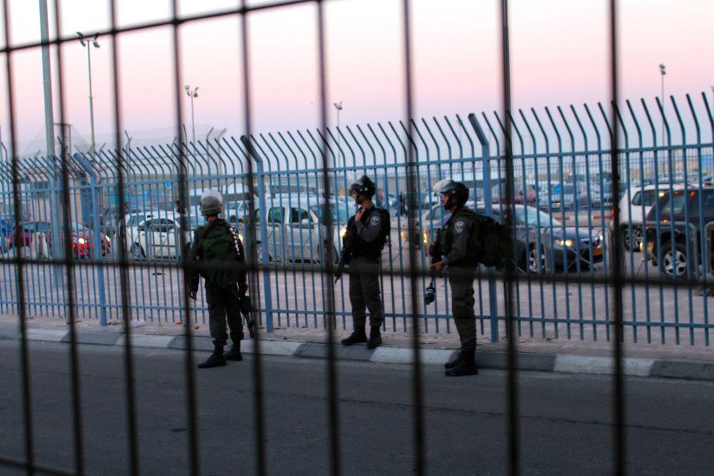 Israeli soldiers in riot gear near a checkpoint between Ramallah and Jerusalem. Jeremy Diamond | Hatchet Staff Photographer