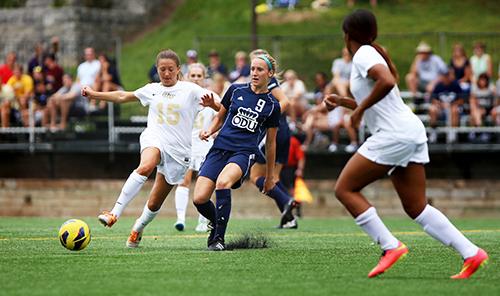 Junior midfielder Nicole Belfonti fights for possession against an Old Dominion player on Aug. 24. Hatchet File Photo