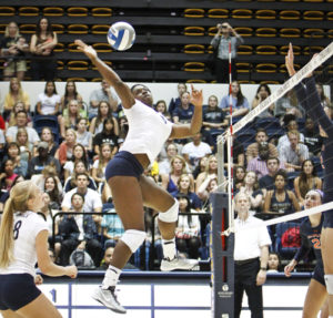 Sophomore Chidima Osuchukwu elevates to hit a ball earlier this season. Hatchet File Photo  