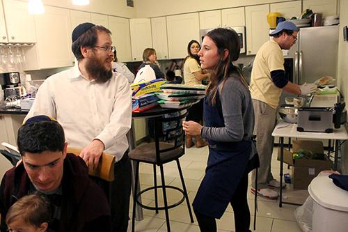 The Steiners prepare for shabbat dinner in their home last week. The D.C. Court of Appeals did not make a decision during a hearing Tuesday on whether they could remain on campus leading GW Chabad. File photo Jordan McDonald | Hatchet Photographer
