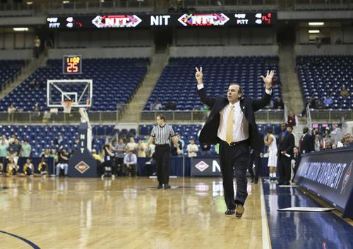 Head coach Mike Lonergan led the Colonials to their first NIT win in program history on Tuesday night against Pitt. Cameron Lancaster | Photo Editor