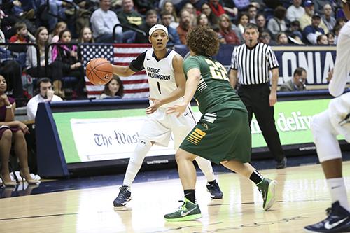 Senior guard Chakecia Miller dished out five assists with only one turnover in her final regular season game as a Colonial. GW toppled George Mason 80-45 Sunday to clinch the A-10 regular season championship. Dan Rich | Hatchet Photographer
