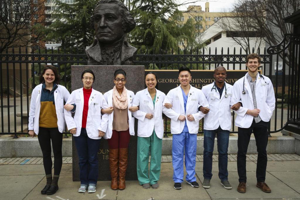 Medical students Megan Fuerst, Crystal Xue, Christian Hendrix, Nina Abon, Christopher Wong, Chisom Okezue and Max Ruben are some of the 175 School of Medicine and Health Sciences students who signed a petition to stop Congress’s repeal of the Affordable Care Act.