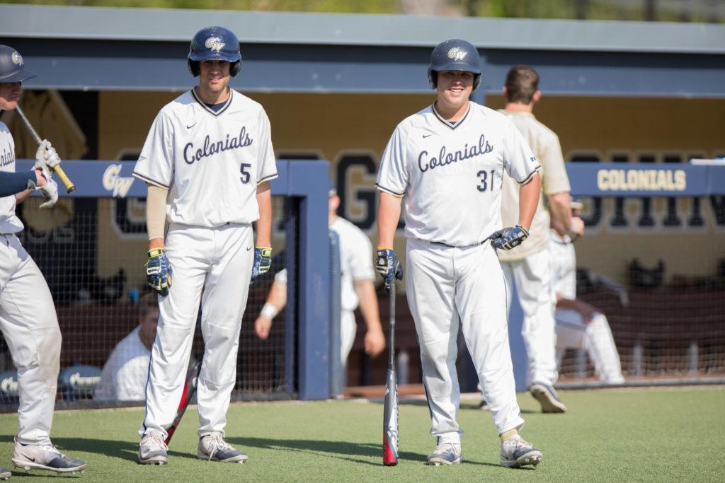 Seniors first baseman Bobby Campbell and third baseman Cody Bryant stand outside of the dugout during a game against Coppin State April 18.