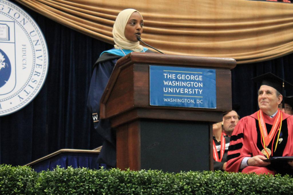 Huda Ibrahim, student speaker and recipient of the Distinguished Master's Degree Scholar Award,  addresses her fellow graduates at the Columbian College of Arts and Sciences Master's Program Celebration.