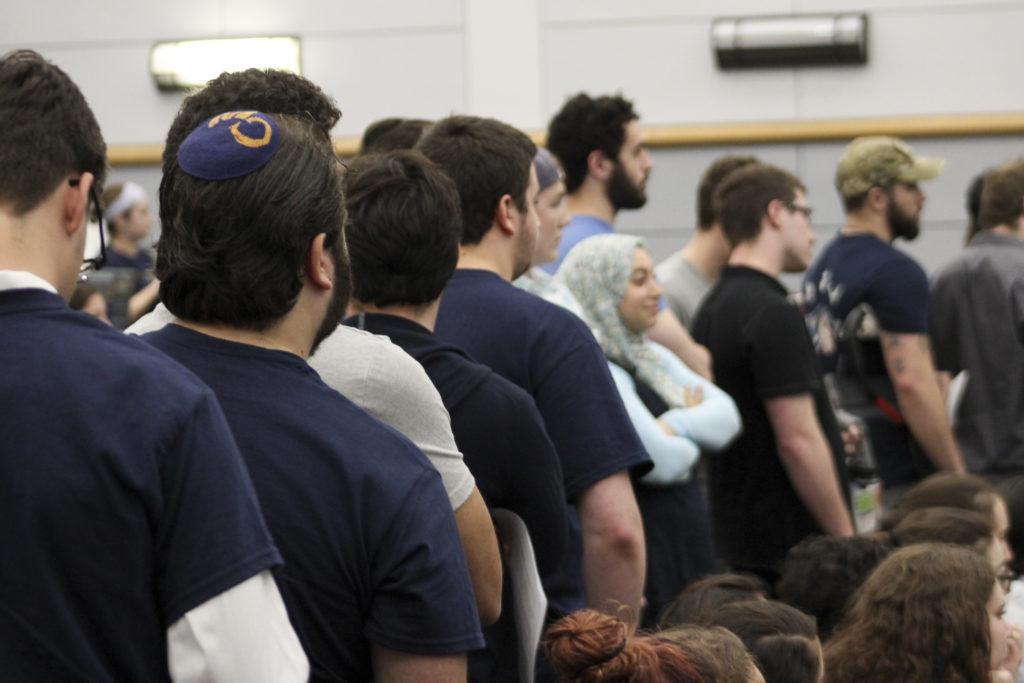 Students waited in line to speak in front of the Student Association Senate Monday night to offer their opinion on the pro-Palestinian divestment resolution. The senate narrowly rejected the resolution.