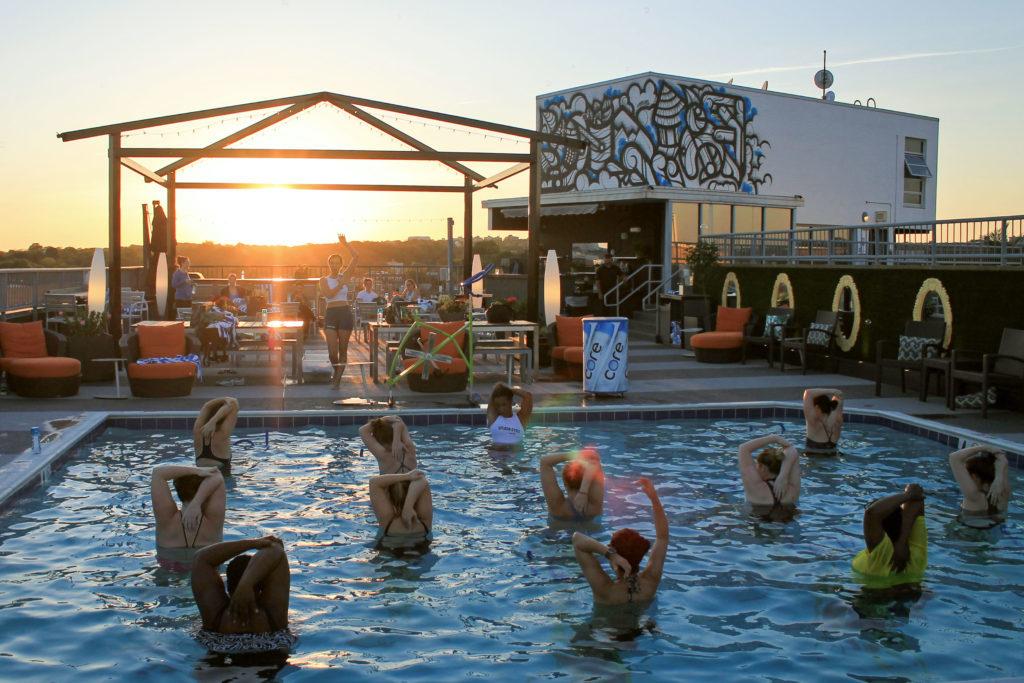 Cyclists in SplashCycle on the roof of the Embassy Row Hotel, located at 2015 Massachusetts Ave, unwind and watch the sunset at the 8 p.m. class. 