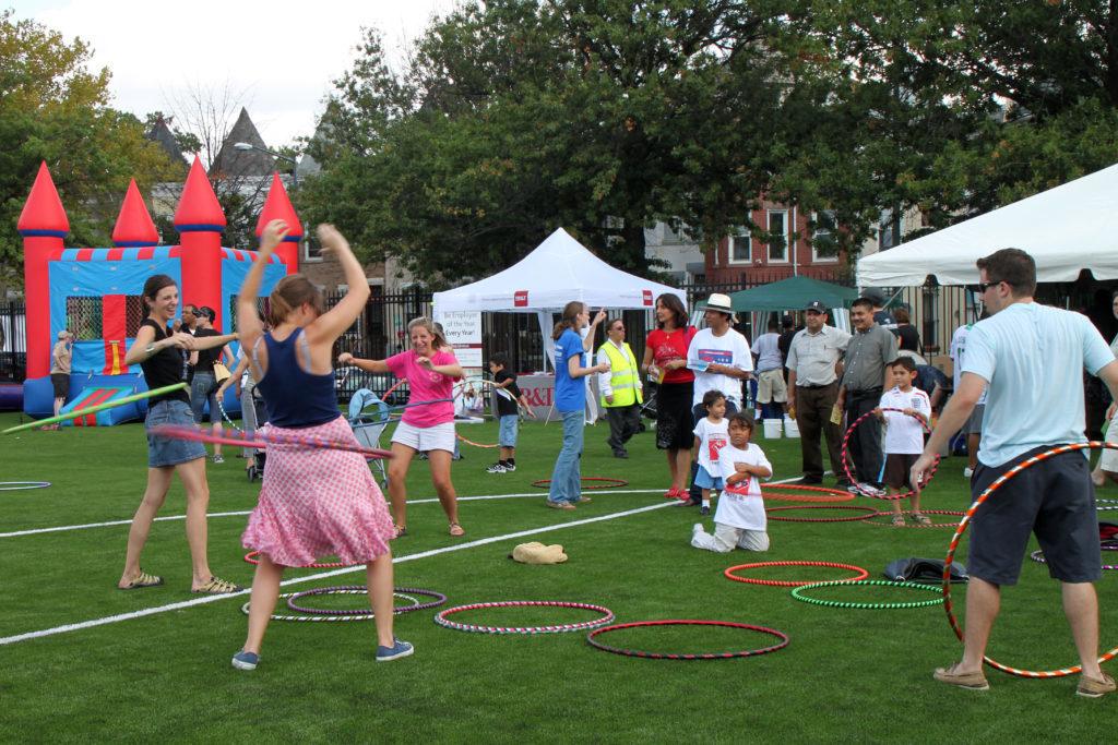 Local residents celebrating at last year's annual Columbia Heights neighborhood festival. Check out the 12th annual festival this weekend that will span two blocks on 11th Street.