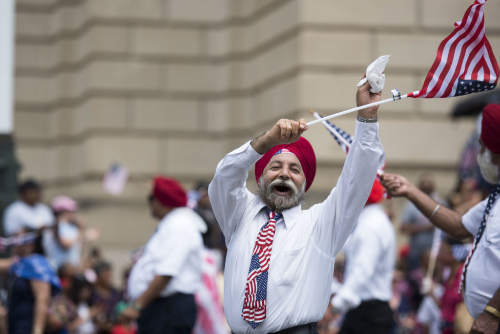 A member of the Sikhs of America marches in the Fourth of July parade.