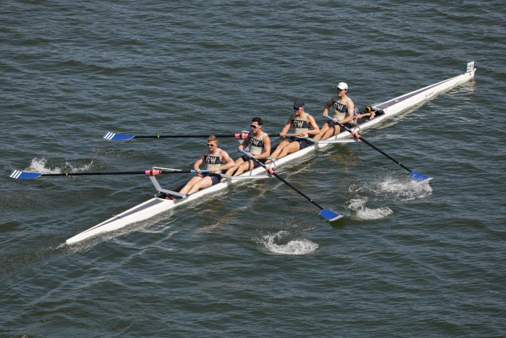 One of the mens rowing Four-With boats races down the river during the Head of the Potomac Sunday.