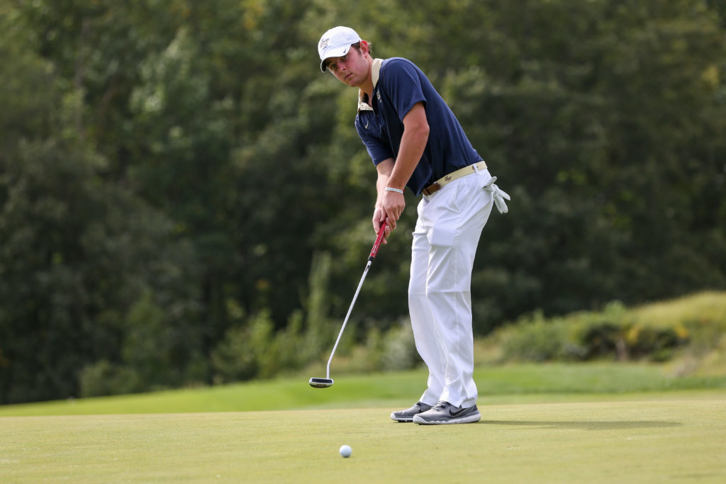 Senior Jack Porcelli putts a ball during a tournament in the fall of 2015.