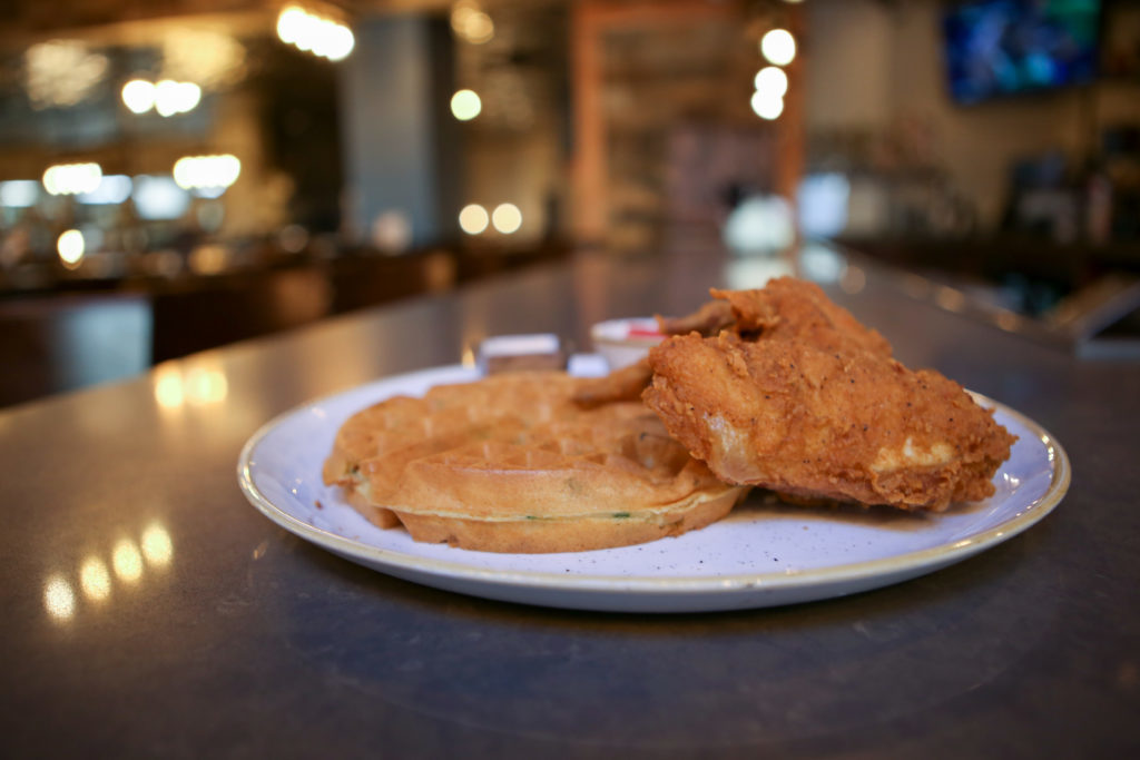 Hen Quarter, located at 750 E St. NW, exudes Southern charm with classic fried dishes, warm wood accents and bright white lights. Order the chicken and waffles ($18) for a traditional Southern meal.