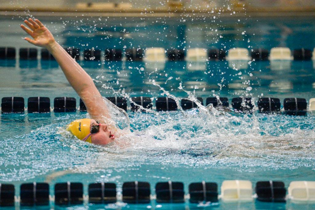 Sophomore Elizabeth Vogel races during swimming and diving's first dual meet of the year at Howard Saturday.