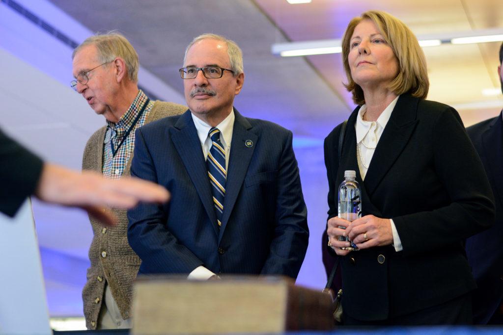 University President Thomas LeBlanc and his wife Anne learn about George Washingtons inaugural Bible that was on display Monday during a celebration in the Science and Engineering Hall.