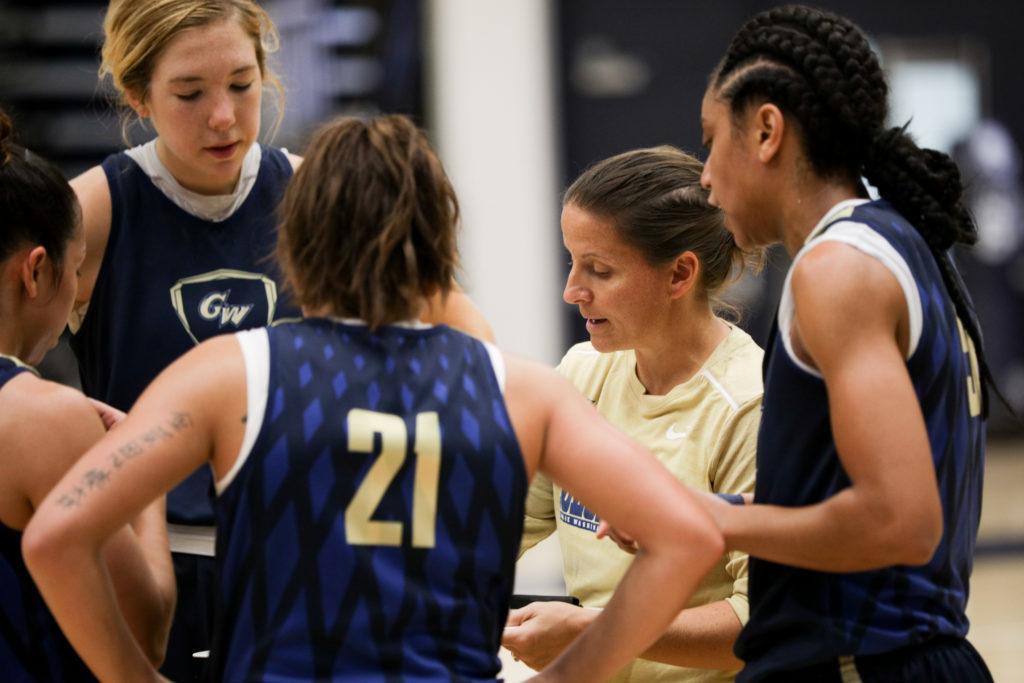Women's basketball head coach Jennifer Rizzotti talks to her team during a practice last week.