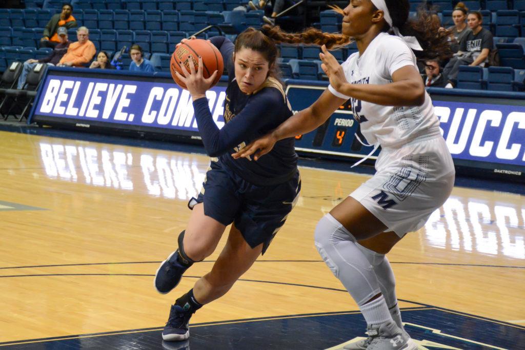 Sophomore+forward+Kendall+Bresee+drives+past+a+Hawks+defender+during+a+womens+basketball+game+at+Monmouth+Friday.