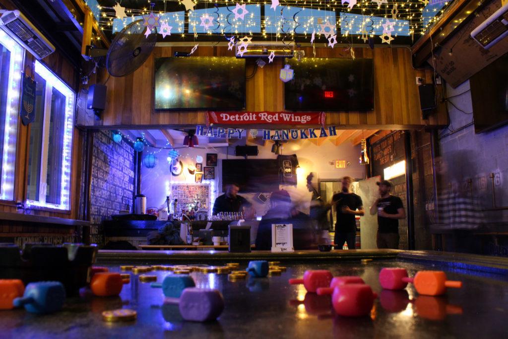 Ivy and Coney, a Chicago and Detroit-themed sports bar, was transformed into a pop-up Hanukkah bar called Chai-vy and Cohen-y Friday.