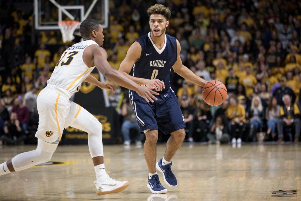 Freshman guard Justin Mazzulla dribbles the ball up the court during GW's loss against VCU on Jan. 20. 