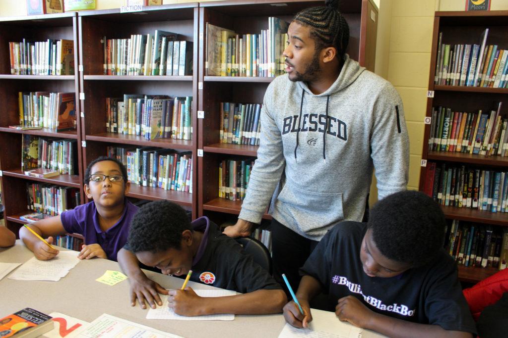 Assistant Principal Michael Redmond started a book club for minority boys that initiated a wave of book clubs across the Truesdell Education Campus earlier this year.