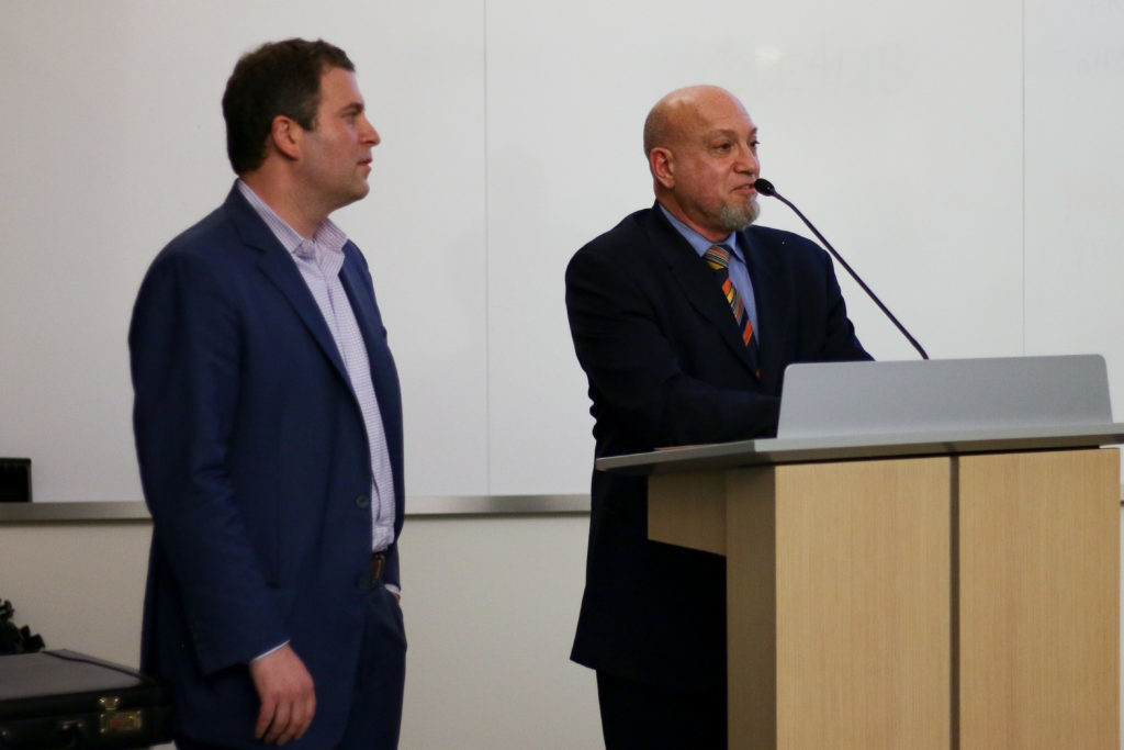 Edward Grandis, a lawyer representing FoBoGro's owners, (left) speaks alongside his client Seth Rosenzweig at a Foggy Bottom and West End Advisory Neighborhood Commission meeting Wednesday night.

