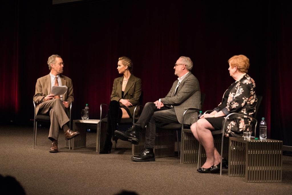 New York Times reporter Scott Shane moderates a panel with actor Jennifer Lawrence, director Francis Lawrence and retired CIA agent Jonna Hiestand Mendez.
