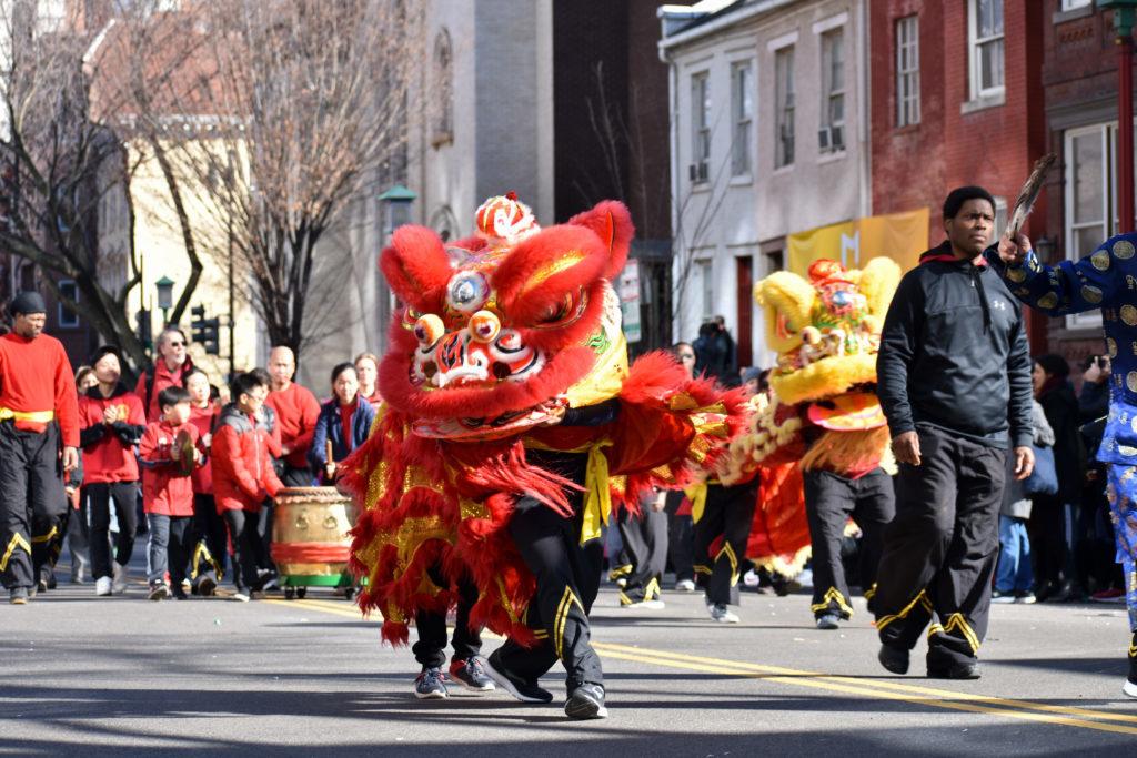 Lion Dancers celebrate the Year of the Dog at the Chinese New Year Parade in Chinatown Sunday, hosted by the Chinese Consolidated Benevolent Association.