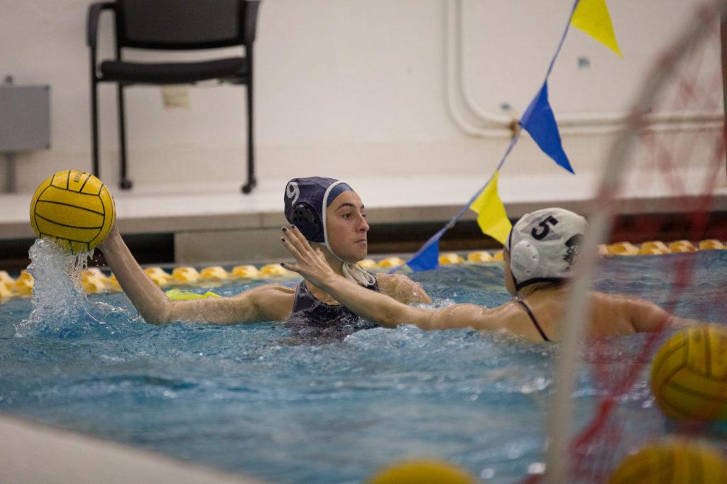 Senior+attacker+Jacqueline+Bywater+looks+for+a+teammate+to+pass+to+during+a+womens+water+polo+practice+Tuesday.