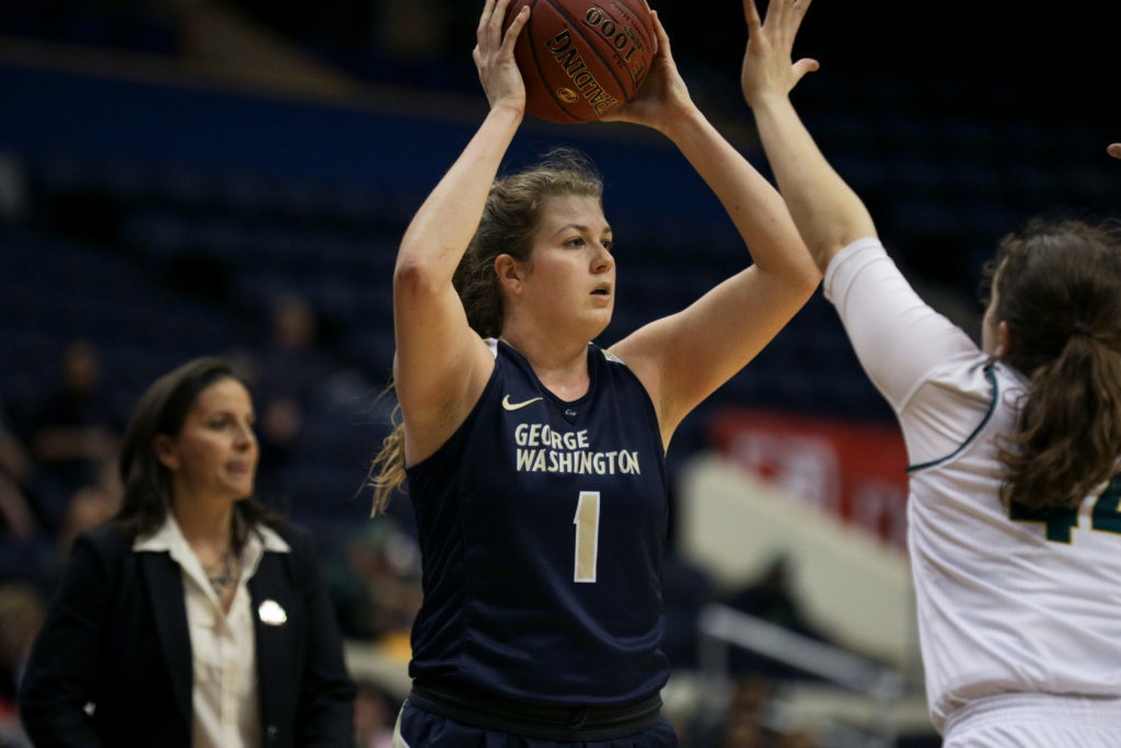 Junior forward Kelsi Mahoney looks to pass the ball during a second-round game of the A-10 Championships against George Mason earlier in March.