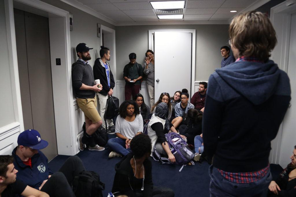 More than 20 graduate and undergraduate students sat on the eighth floor of Rice Hall Thursday morning to press administrators to meet with organizers aiming to start a graduate student union.