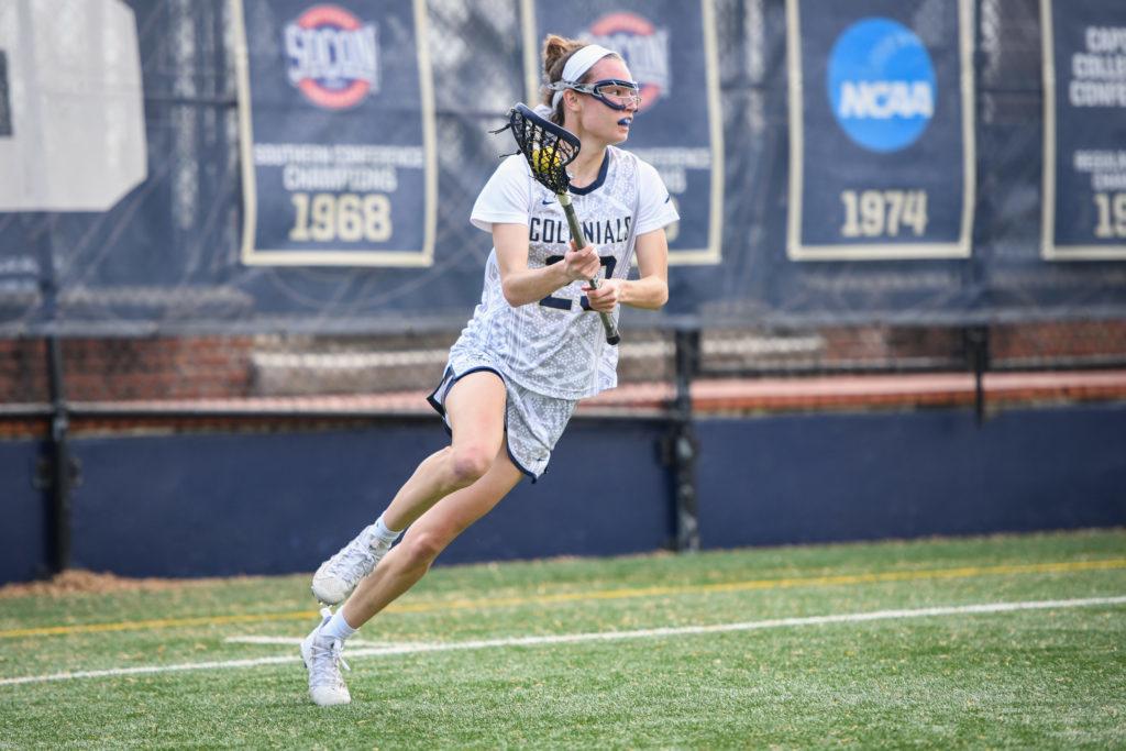 Senior attacker Jocelyn Donohue controls the ball during a lacrosse game against George Mason Thursday.
