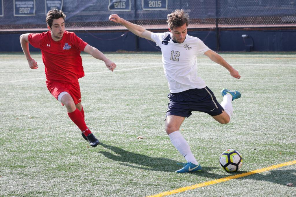 Sophomore+midfielder+George+Dise+prepares+to+strike+the+ball+in+an+exhibition+match+against+American+Tuesday.