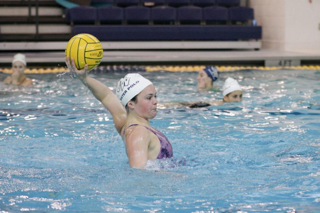 Freshman attacker Hannah Hathaway throws the ball during a womens water polo practice last week.