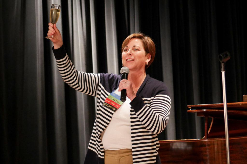 Michelle Rubin, a Class of 1991 alumna whose parents also graduated from GW, proposes a toast during the Legacy Family Commencement Reception Friday.