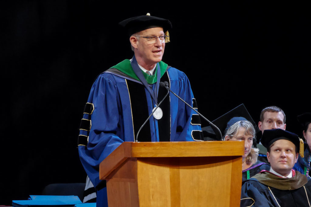 Jeffrey Akman, the dean of the School of Medicine and Health Sciences, welcomed graduates to the schools commencement ceremony Saturday.